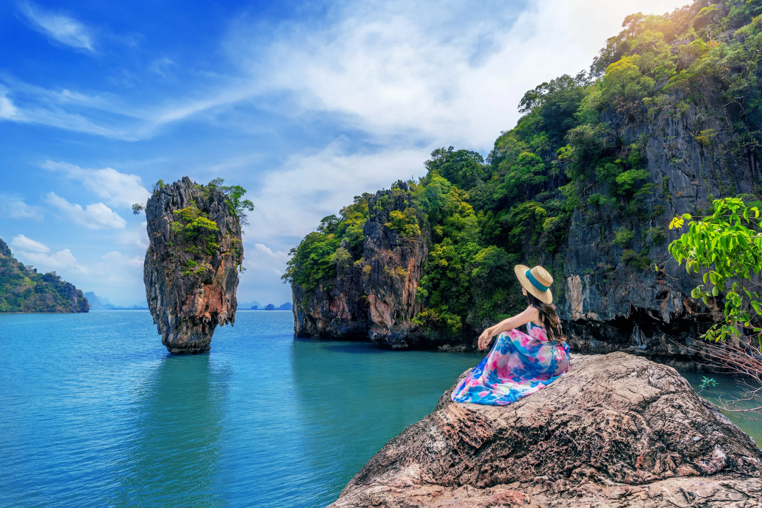 Home beautiful girl sitting rock james bond island phang nga thailand